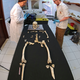 Scientists analyzing the skeleton at Liverpool John Moores University in the UK.